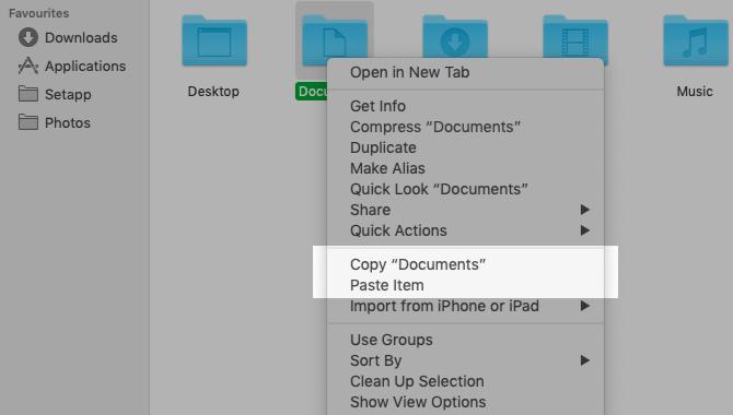 خيارات النسخ واللصق في قائمة سياق Finder على Mac